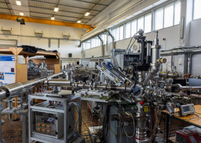 Visitors observing accelerator systems and laboratory setup at Jožef Stefan Institute Open Day (photo: Marjan Verč, 2026)