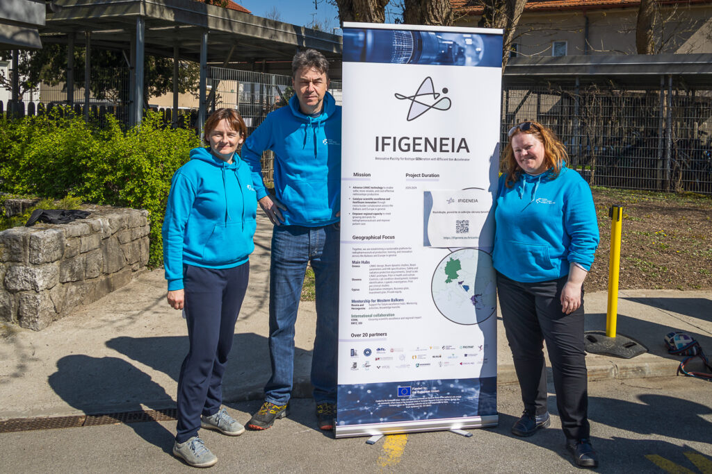 Three Jožef Stefan Institute colleagues presenting the IFIGENEIA project at the institute’s open day event (photo: Marjan Verč, 2026)