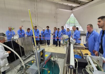 Visitors touring Jožef Stefan Institute during IFIGENEIA-related visit