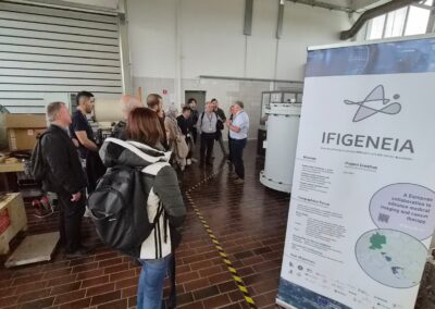 IFIGENEIA banner displayed during networking and research facility visit